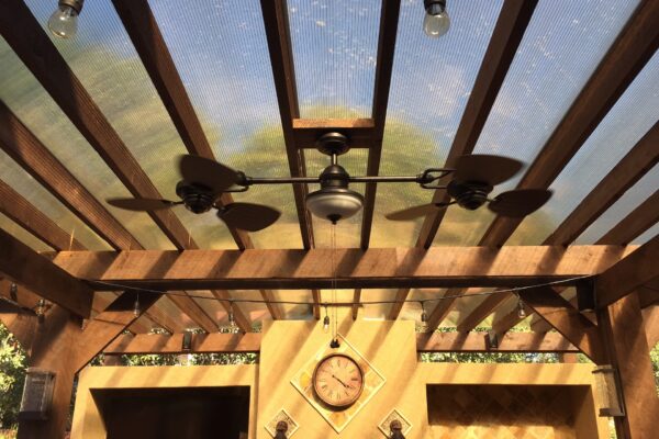 Patio with lights and fan.