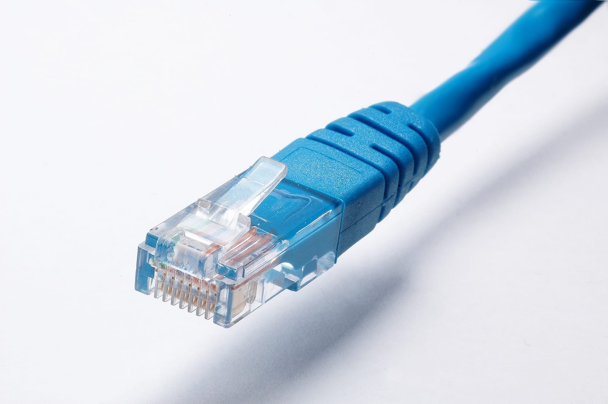 Photo shows a blue ethernet cable. Power of ethernet can be a flexible option for low-voltage applications.